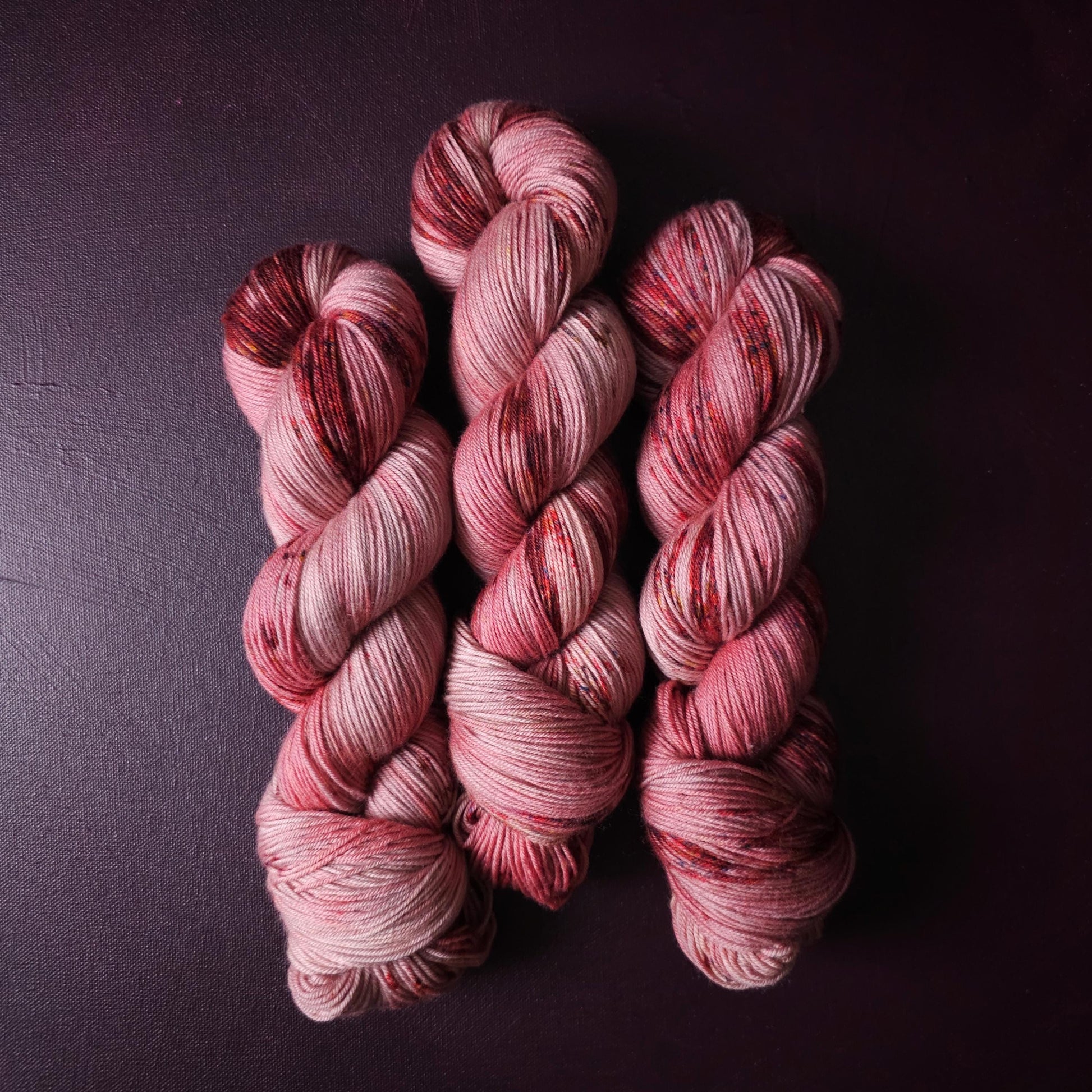 Rasberry Dripple, hand dyed merino singles yarn, gifts for knitters, gold lurex sock yarn, colorful knitting supplies, merino crochet yarn