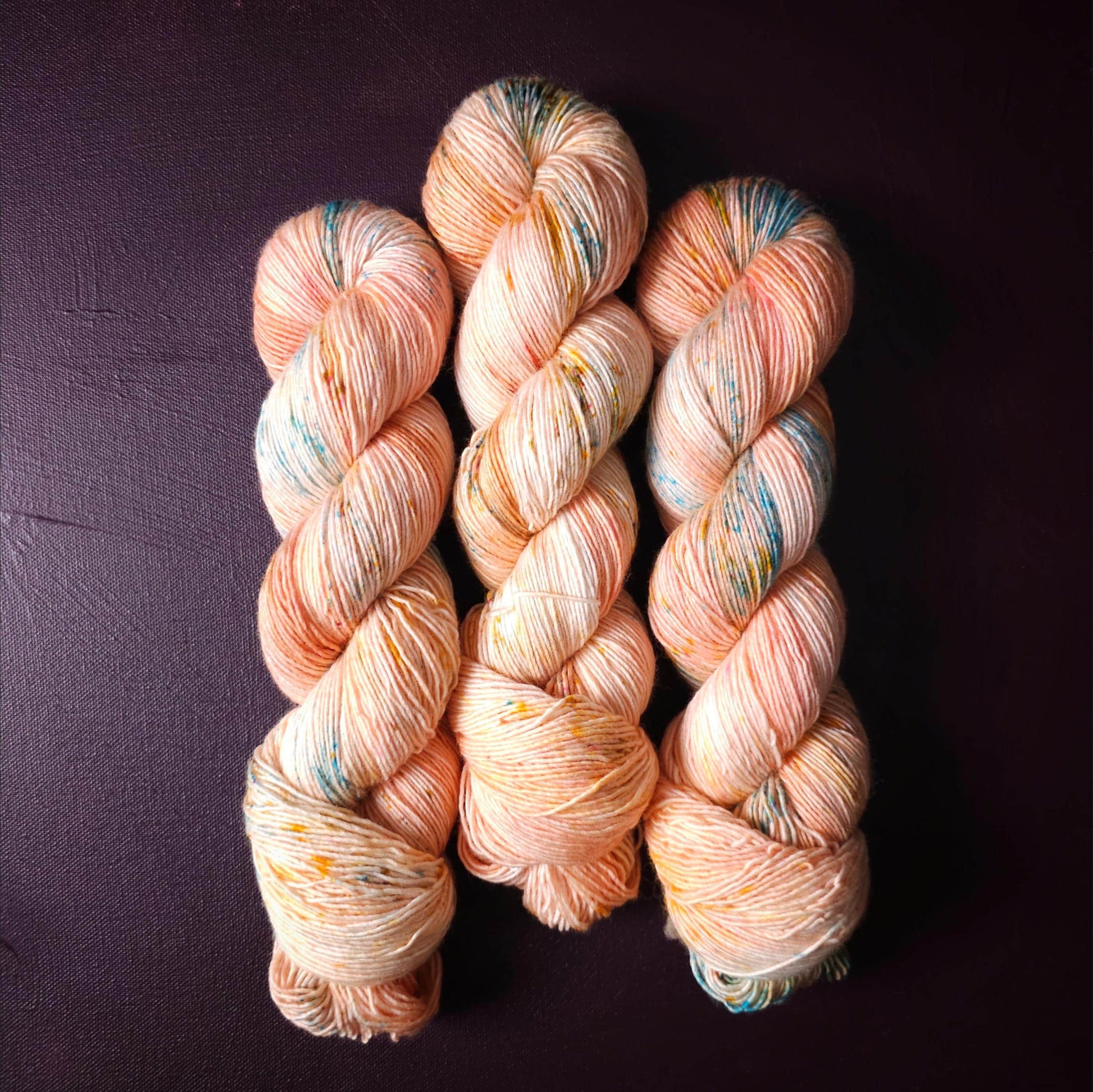 Coral Cloud, hand dyed gradient sock yarn, gifts for knitters, gold lurex sock yarn, colorful knitting supplies, merino crochet yarn