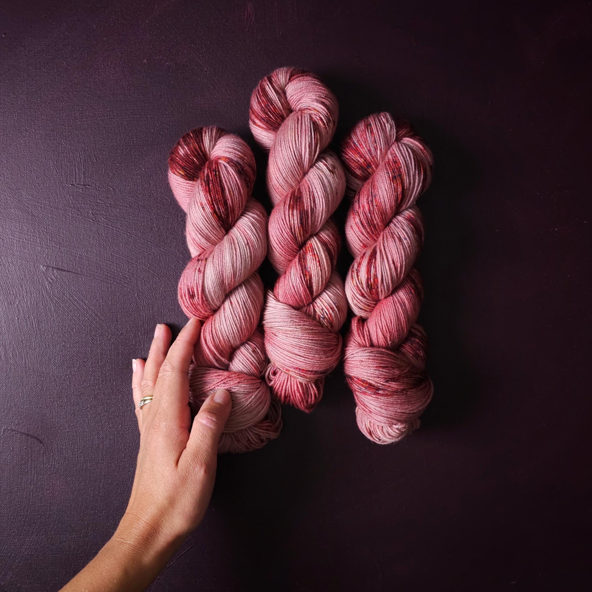 Rasberry Dripple, hand dyed merino singles yarn, gifts for knitters, gold lurex sock yarn, colorful knitting supplies, merino crochet yarn