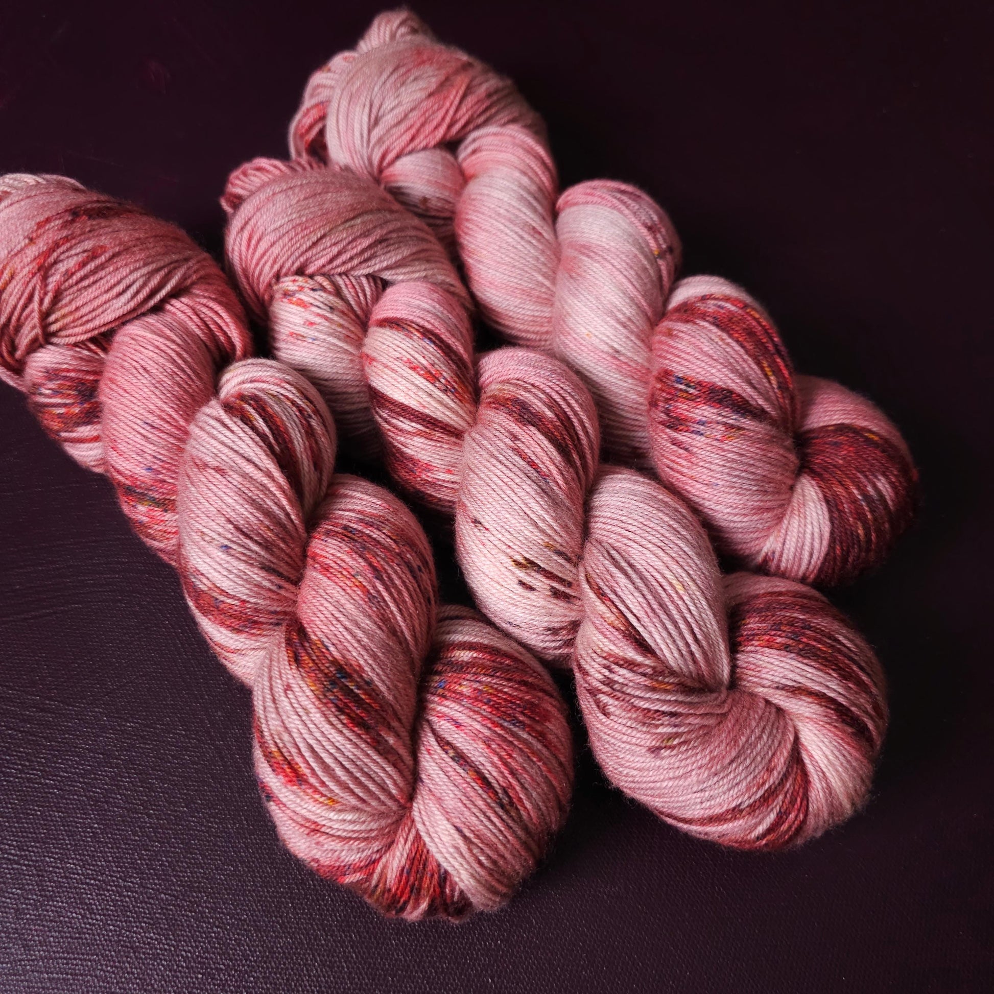Rasberry Dripple, hand dyed merino singles yarn, gifts for knitters, gold lurex sock yarn, colorful knitting supplies, merino crochet yarn