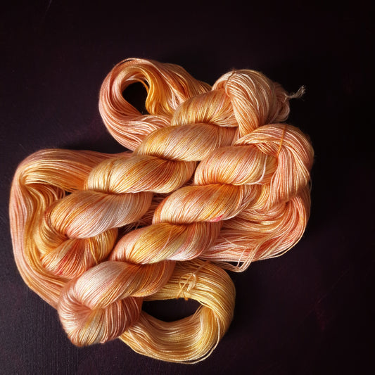 Hand dyed vegan yarn, Lemon Peach, fingering weight tencel thread, hand painted knitting or crochet yarn, shiny plant based weaving yarn,