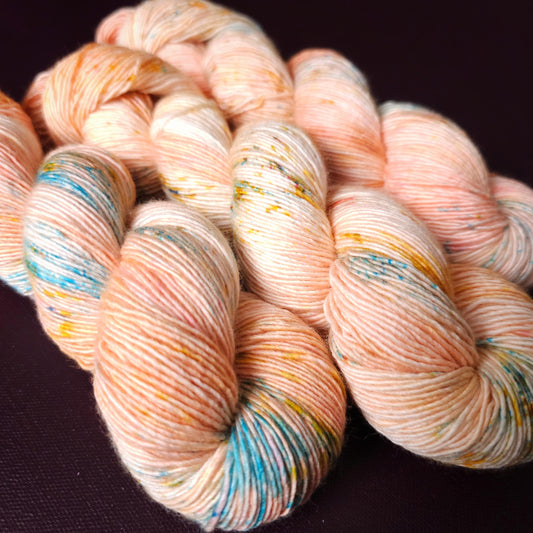 Coral Cloud, hand dyed gradient sock yarn, gifts for knitters, gold lurex sock yarn, colorful knitting supplies, merino crochet yarn