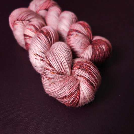 Rasberry Dripple, hand dyed merino singles yarn, gifts for knitters, gold lurex sock yarn, colorful knitting supplies, merino crochet yarn